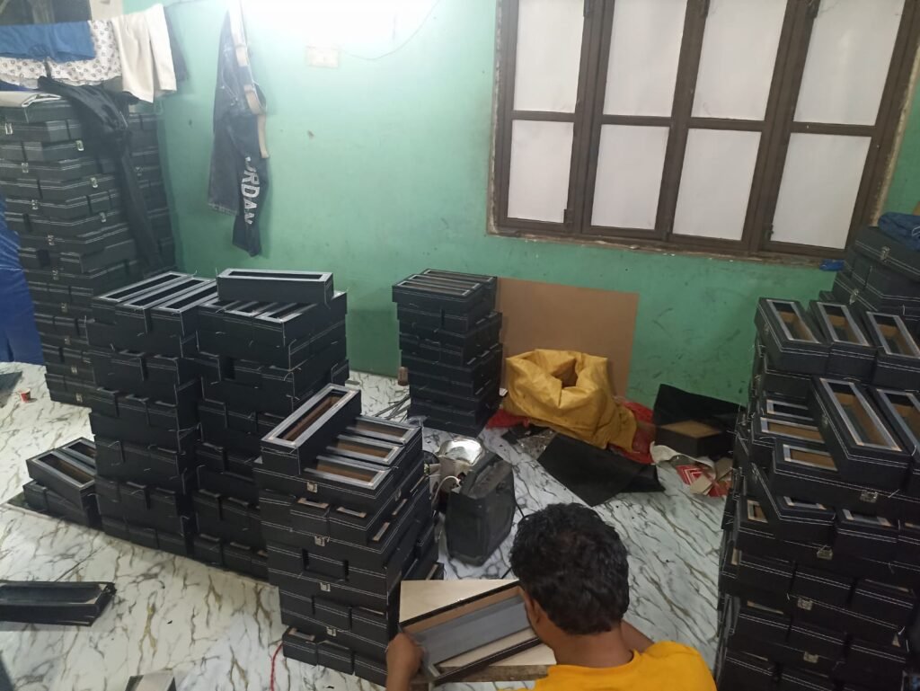 Watch boxes during batch assembly